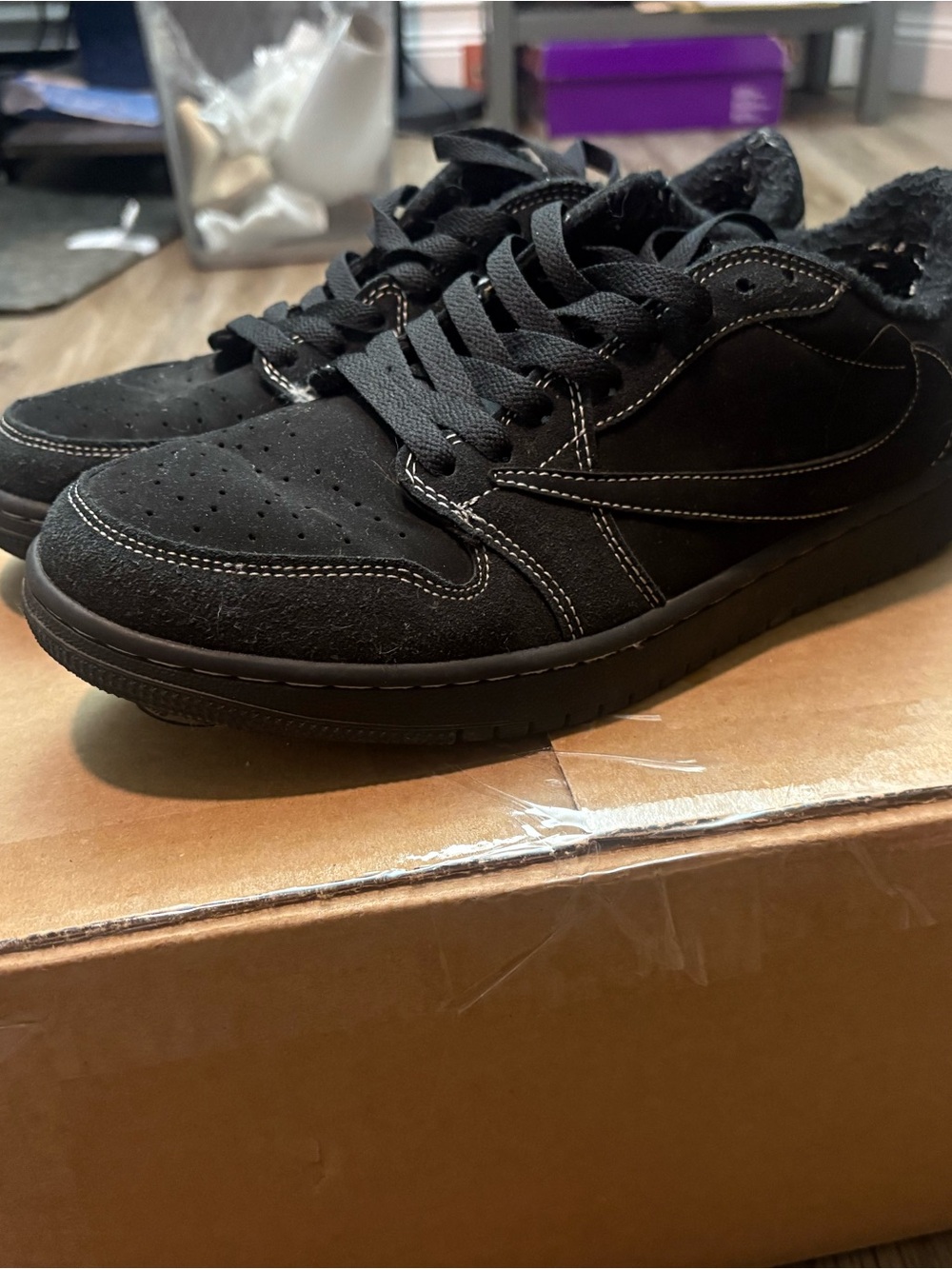 Travis Scott Black Suede Low-Top Sneakers